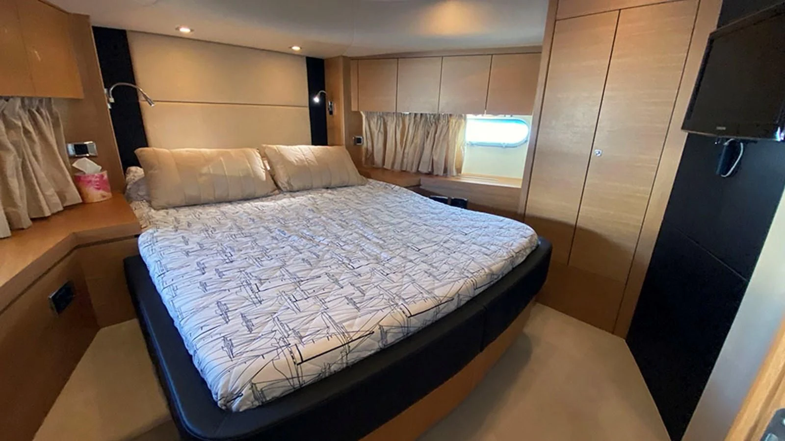a bed in a room aboard LIO Yacht for Sale