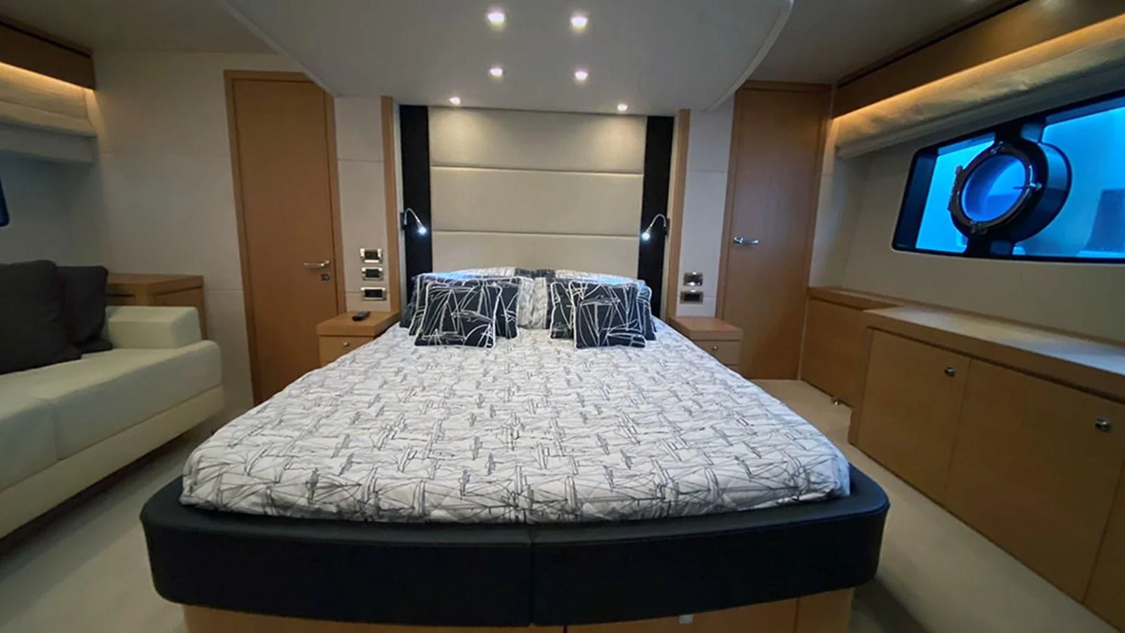 a bed in a room aboard LIO Yacht for Sale