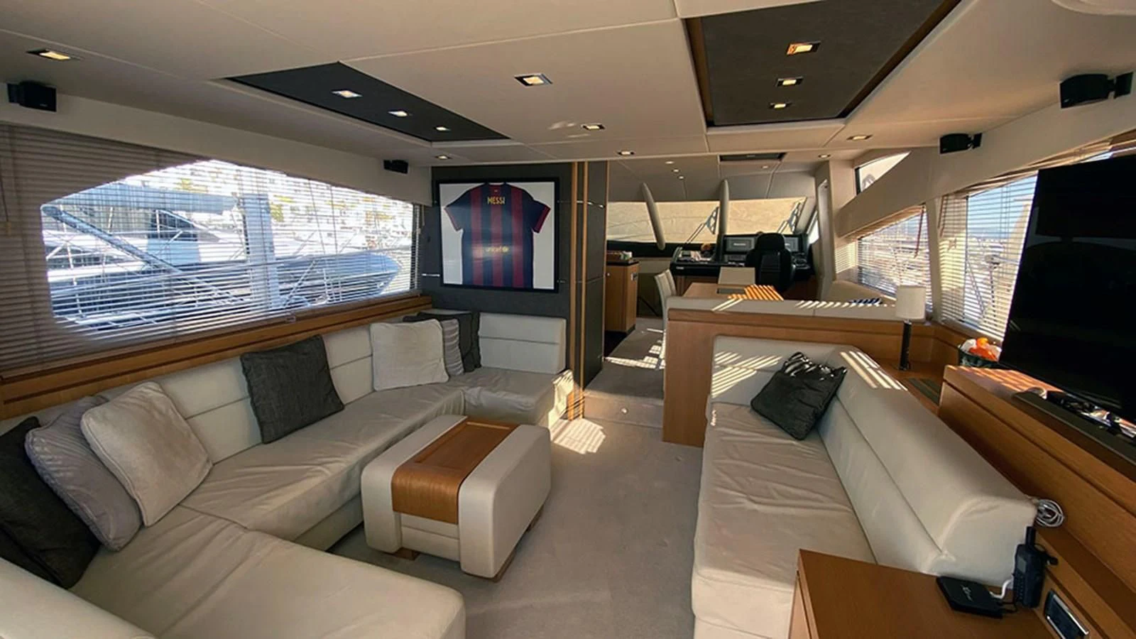 a room with a bed and a tv aboard LIO Yacht for Sale