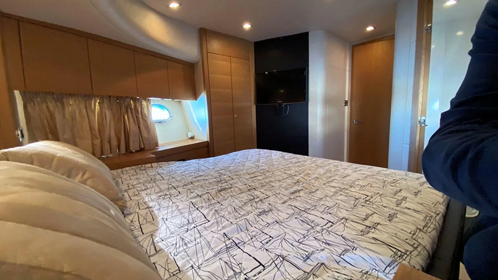 a bed in a room aboard LIO Yacht for Sale