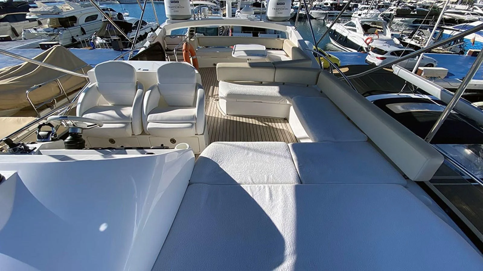 a boat dock with many boats aboard LIO Yacht for Sale