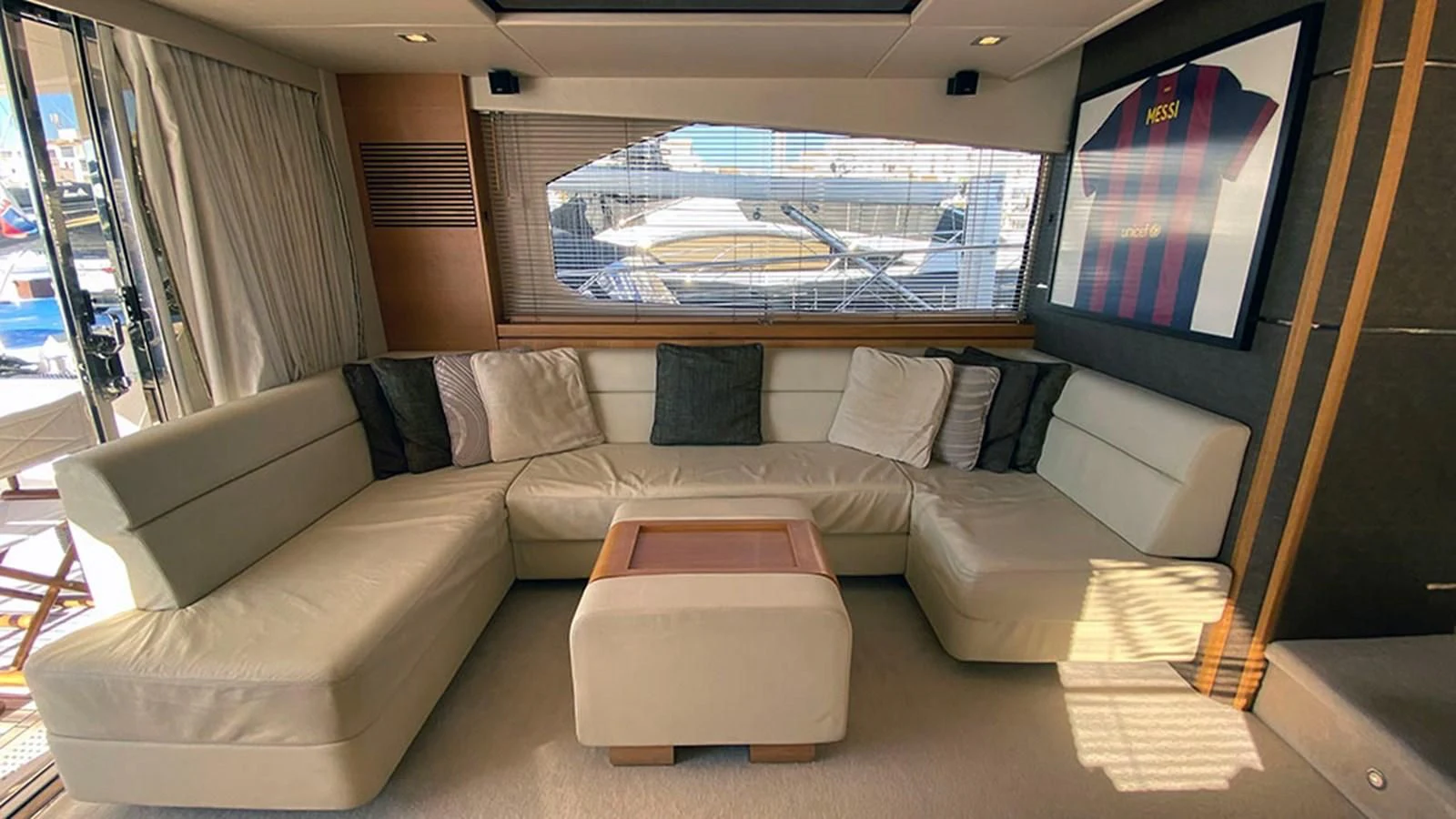 a couch in a room aboard LIO Yacht for Sale
