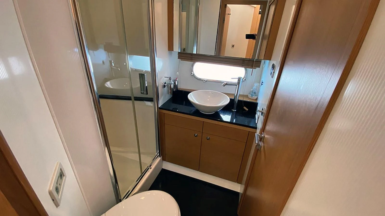 a bathroom with a sink and a toilet aboard LIO Yacht for Sale