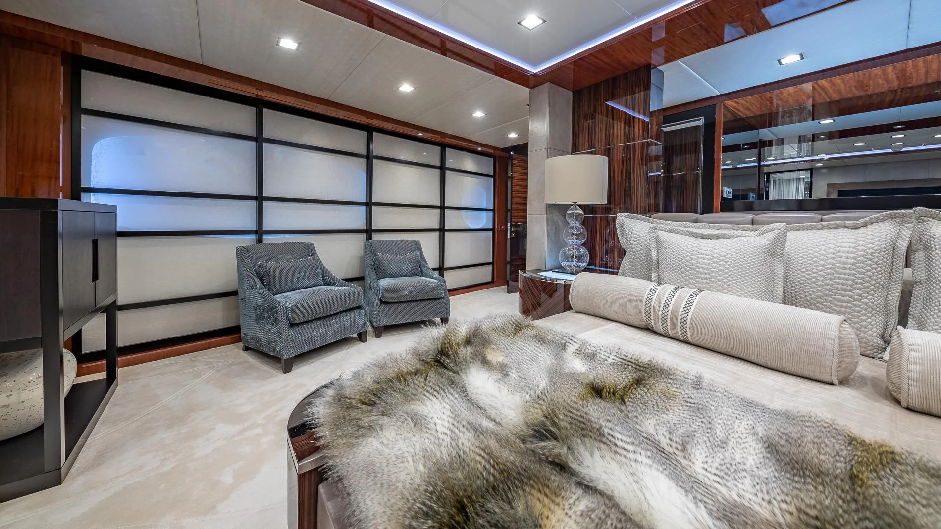 a living room with a large mirror aboard HOLDIN' MY OWN Yacht for Sale
