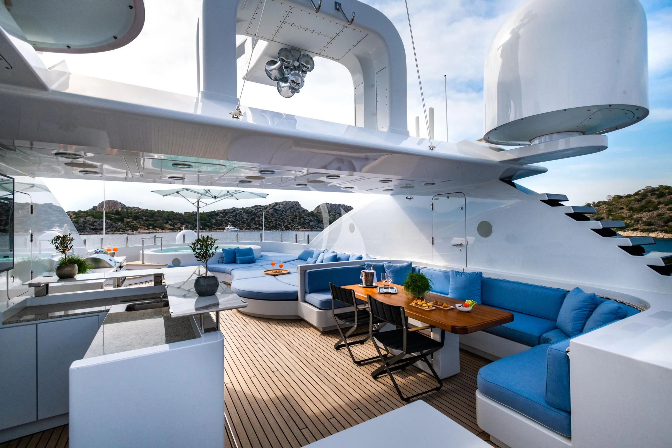 a room with a table and chairs aboard HOLDIN' MY OWN Yacht for Sale