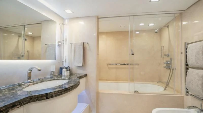 a bathroom with a large bathtub aboard HOLDIN' MY OWN Yacht for Sale