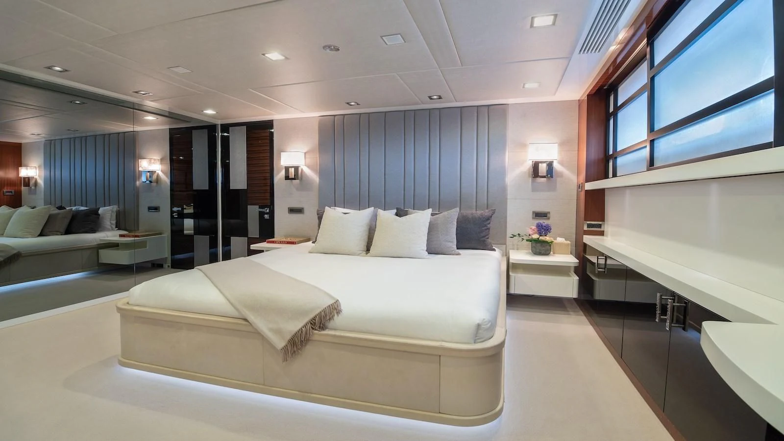 a large room with a bed and a couch aboard HOLDIN' MY OWN Yacht for Sale