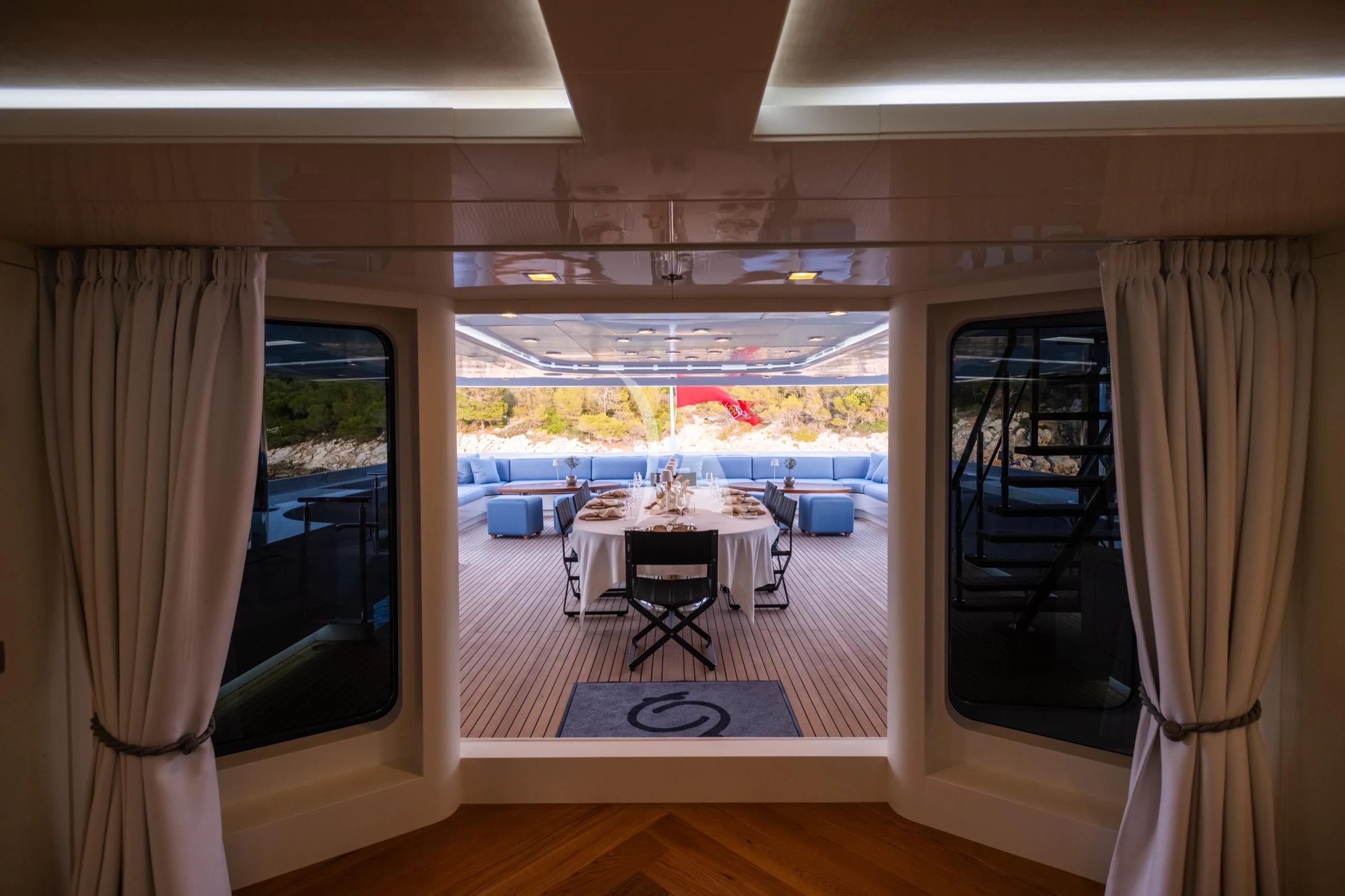 a room with a table and chairs aboard HOLDIN' MY OWN Yacht for Sale