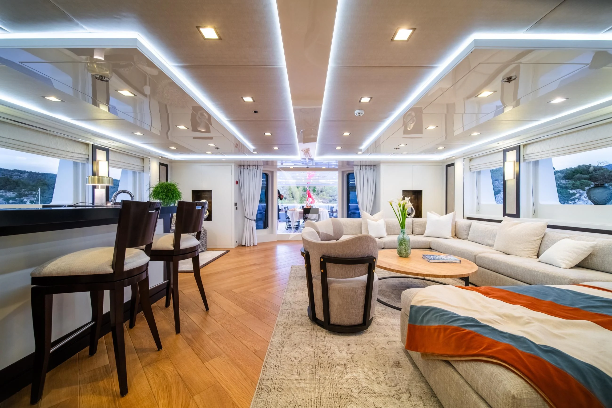 a room with a bed and a table and chairs aboard HOLDIN' MY OWN Yacht for Sale