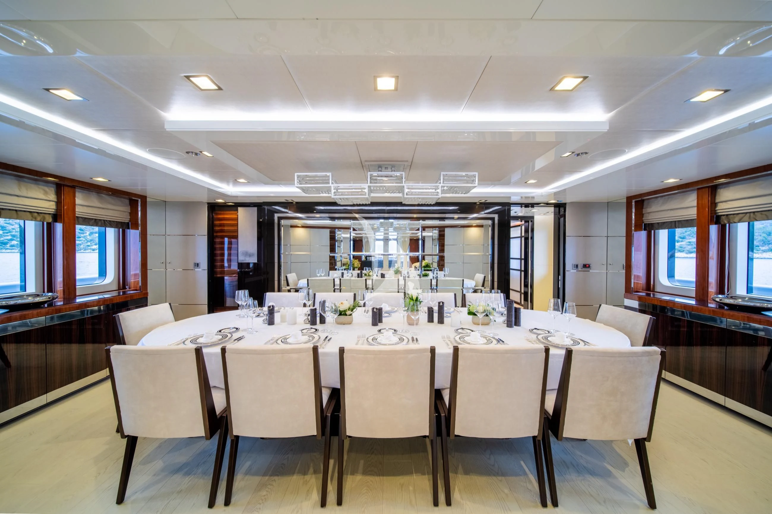 a large room with tables and chairs aboard HOLDIN' MY OWN Yacht for Sale