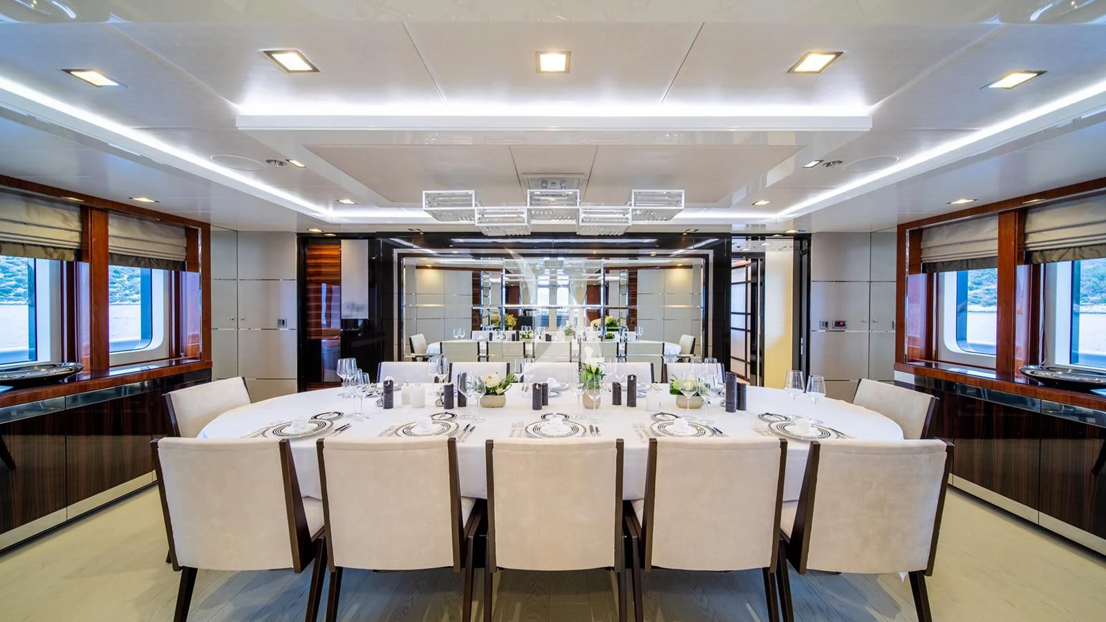 a large room with tables and chairs aboard HOLDIN' MY OWN Yacht for Sale