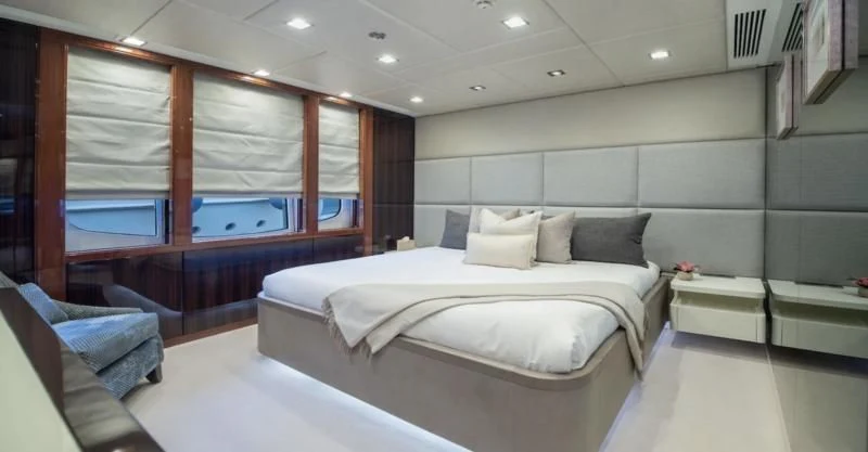 a room with a bed and a couch aboard HOLDIN' MY OWN Yacht for Sale