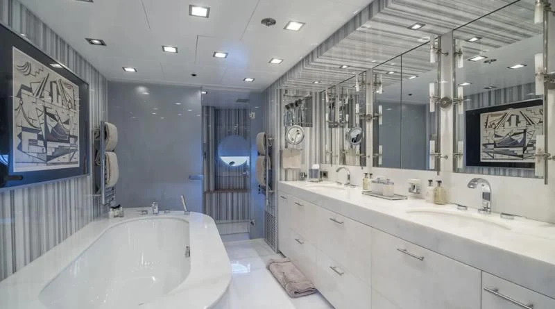 a bathroom with a large bathtub aboard HOLDIN' MY OWN Yacht for Sale