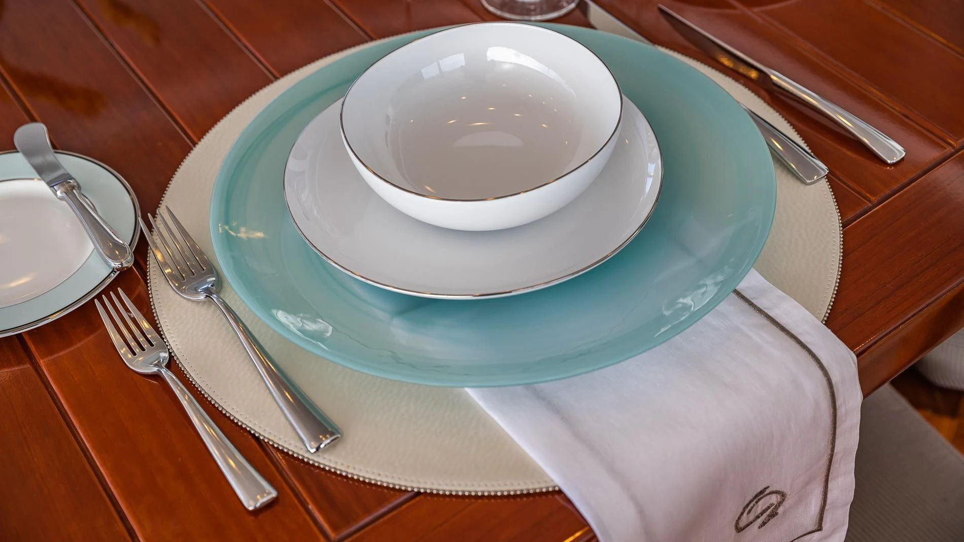 a plate with a bowl on it aboard HOLDIN' MY OWN Yacht for Sale