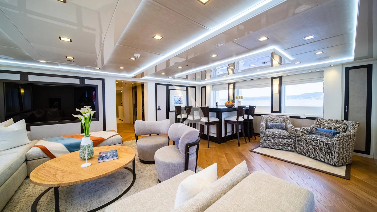 a living room with a couch and a coffee table aboard HOLDIN' MY OWN Yacht for Sale
