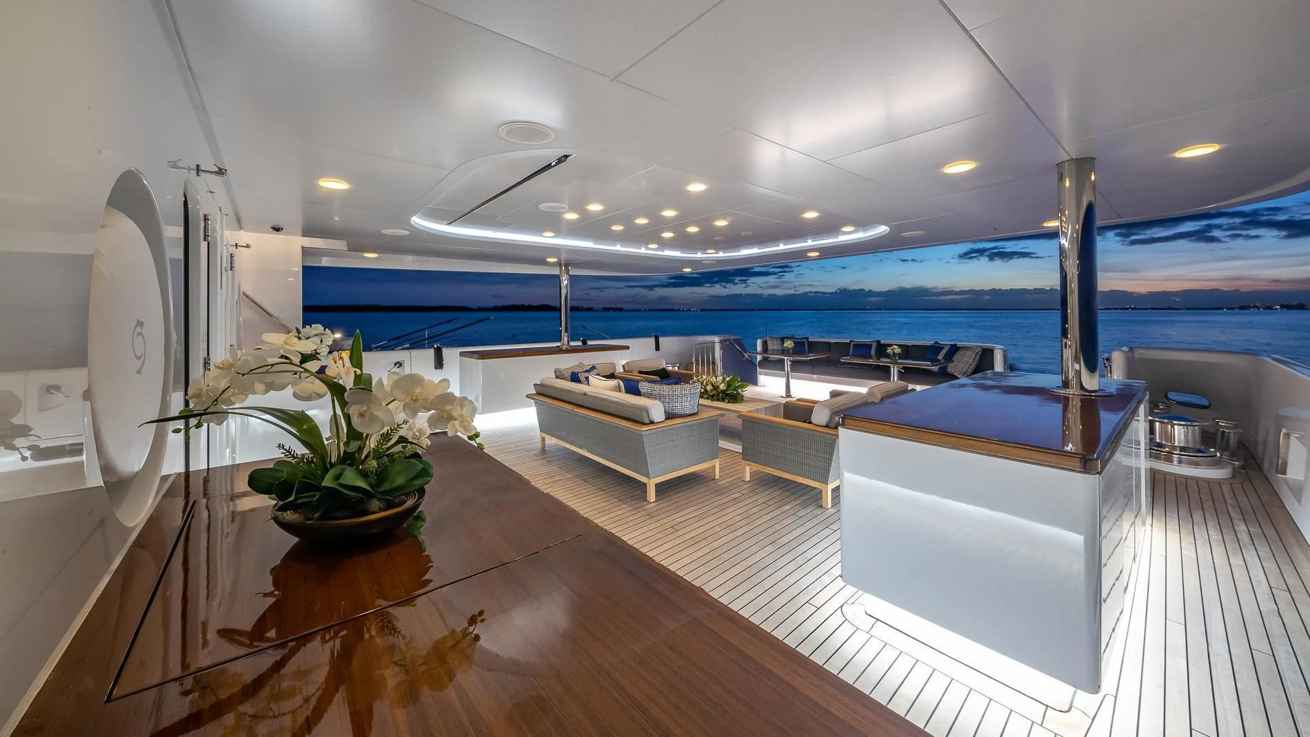 a room with a table and a plant in it aboard HOLDIN' MY OWN Yacht for Sale