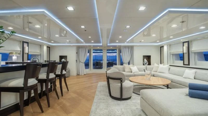 a room with a couch and a table and chairs aboard HOLDIN' MY OWN Yacht for Sale