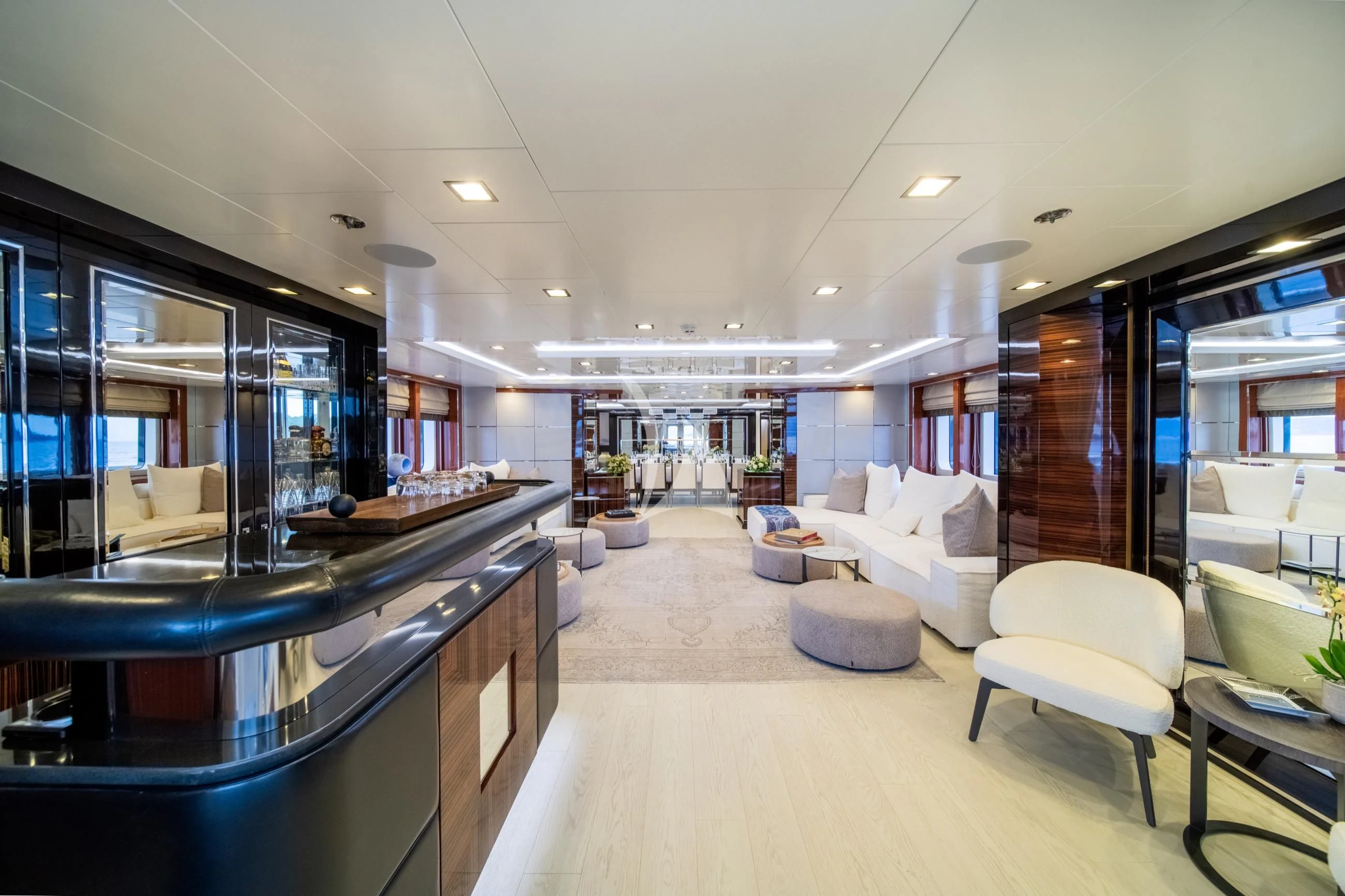 a modern looking kitchen with a bar and bar aboard HOLDIN' MY OWN Yacht for Sale