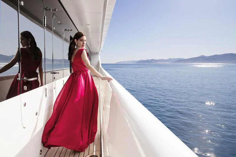 a person in a pink dress on a boat aboard HOLDIN' MY OWN Yacht for Sale