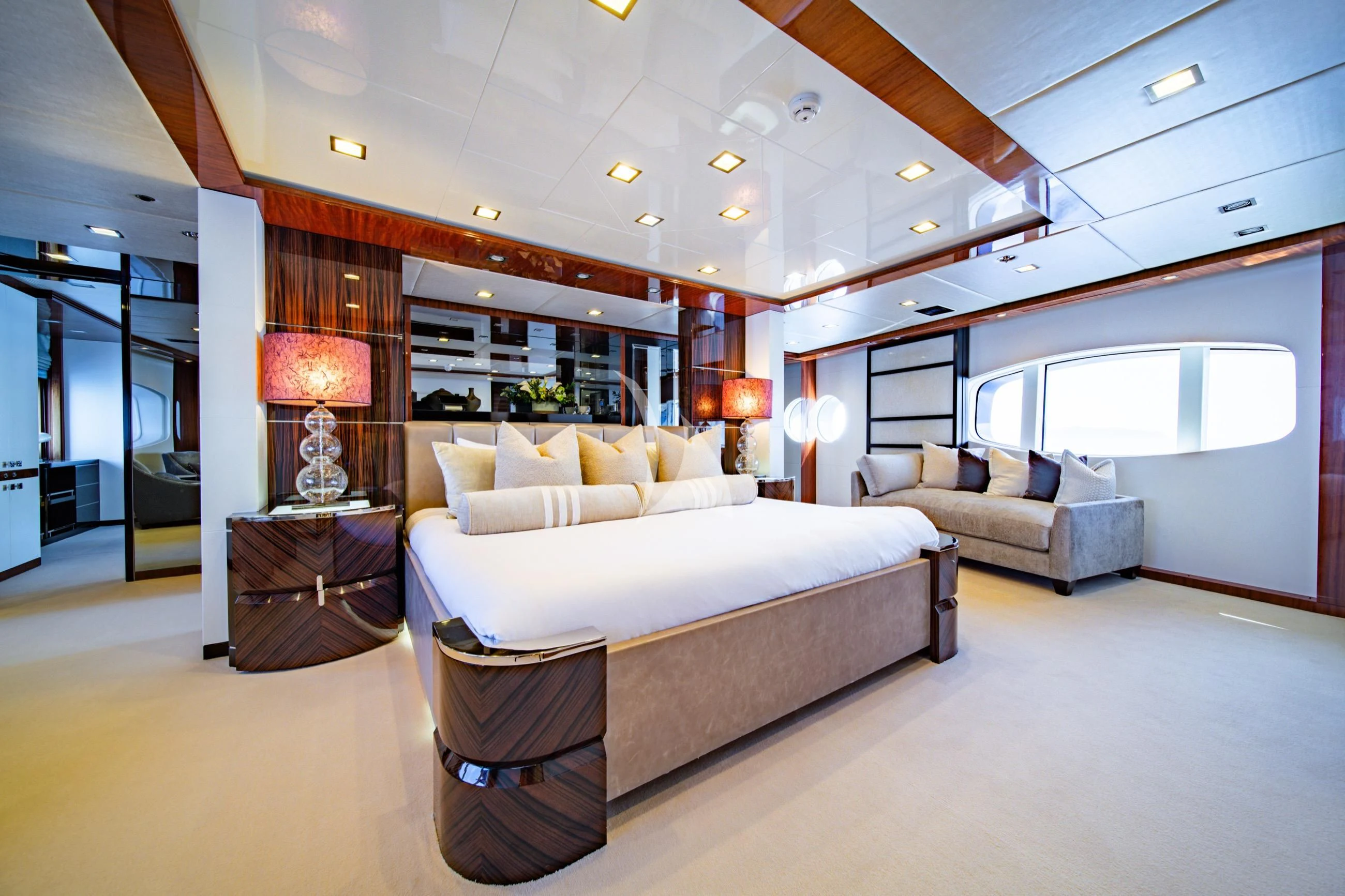 a large room with a bed and a couch aboard HOLDIN' MY OWN Yacht for Sale