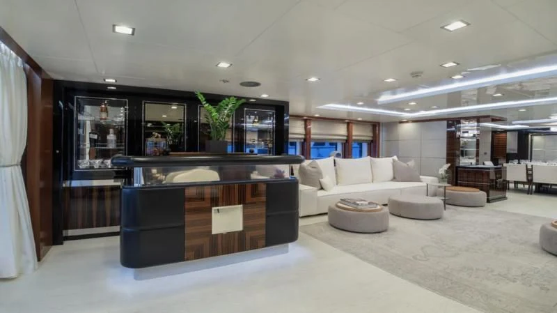 a large room with a large tv and a large glass display case aboard HOLDIN' MY OWN Yacht for Sale
