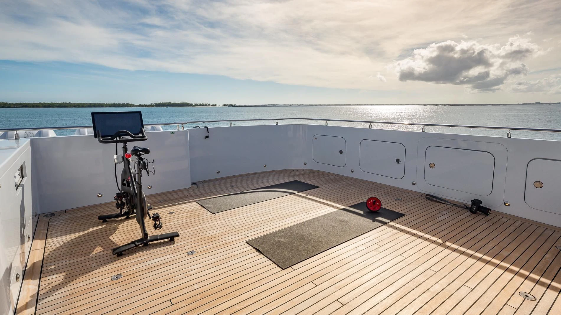 a bicycle on a deck overlooking the ocean aboard HOLDIN' MY OWN Yacht for Sale