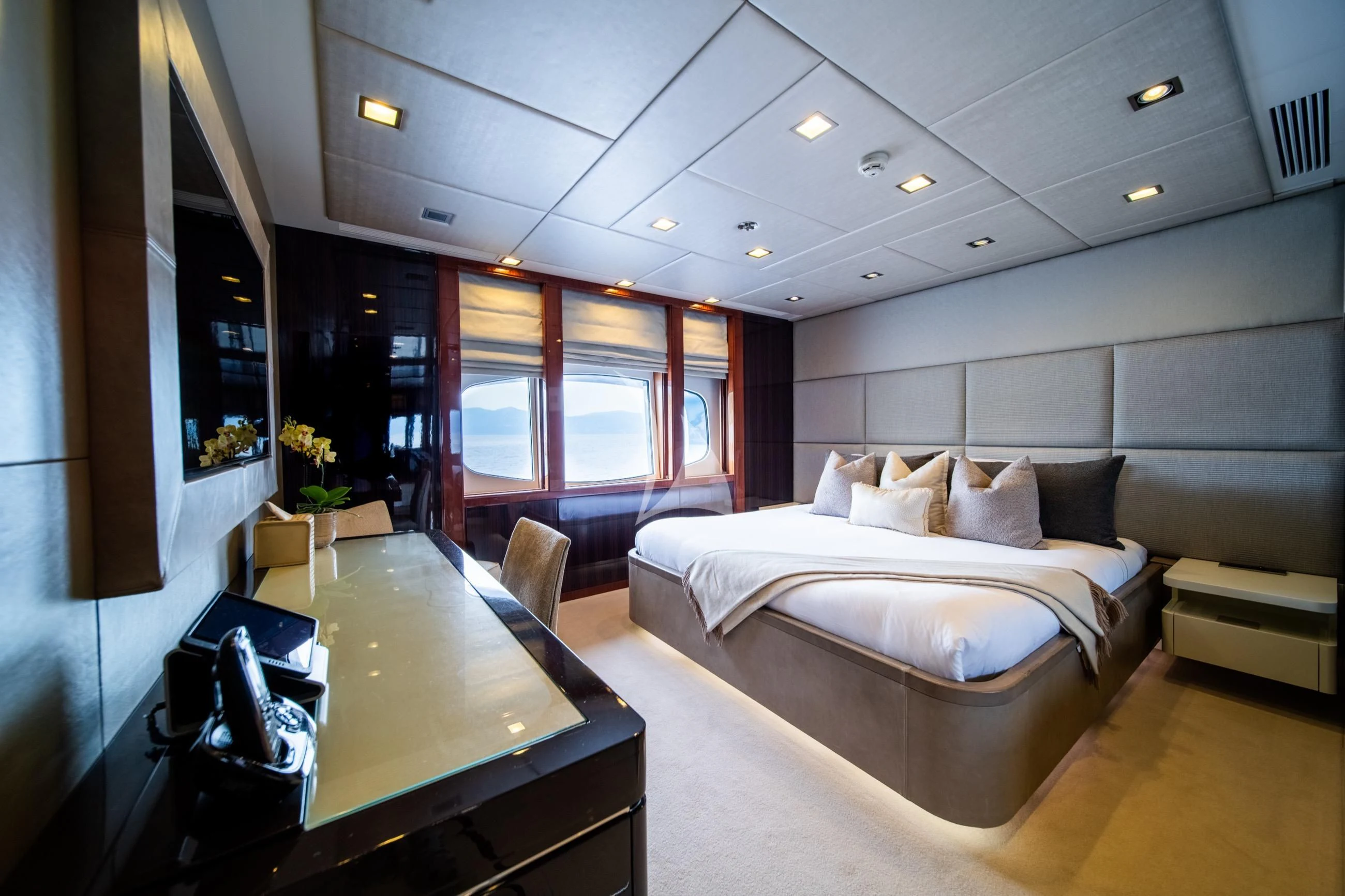 a room with a bed and a desk aboard HOLDIN' MY OWN Yacht for Sale