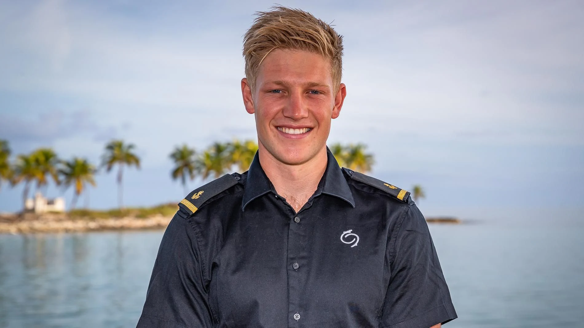 a man smiling for the camera aboard HOLDIN' MY OWN Yacht for Sale