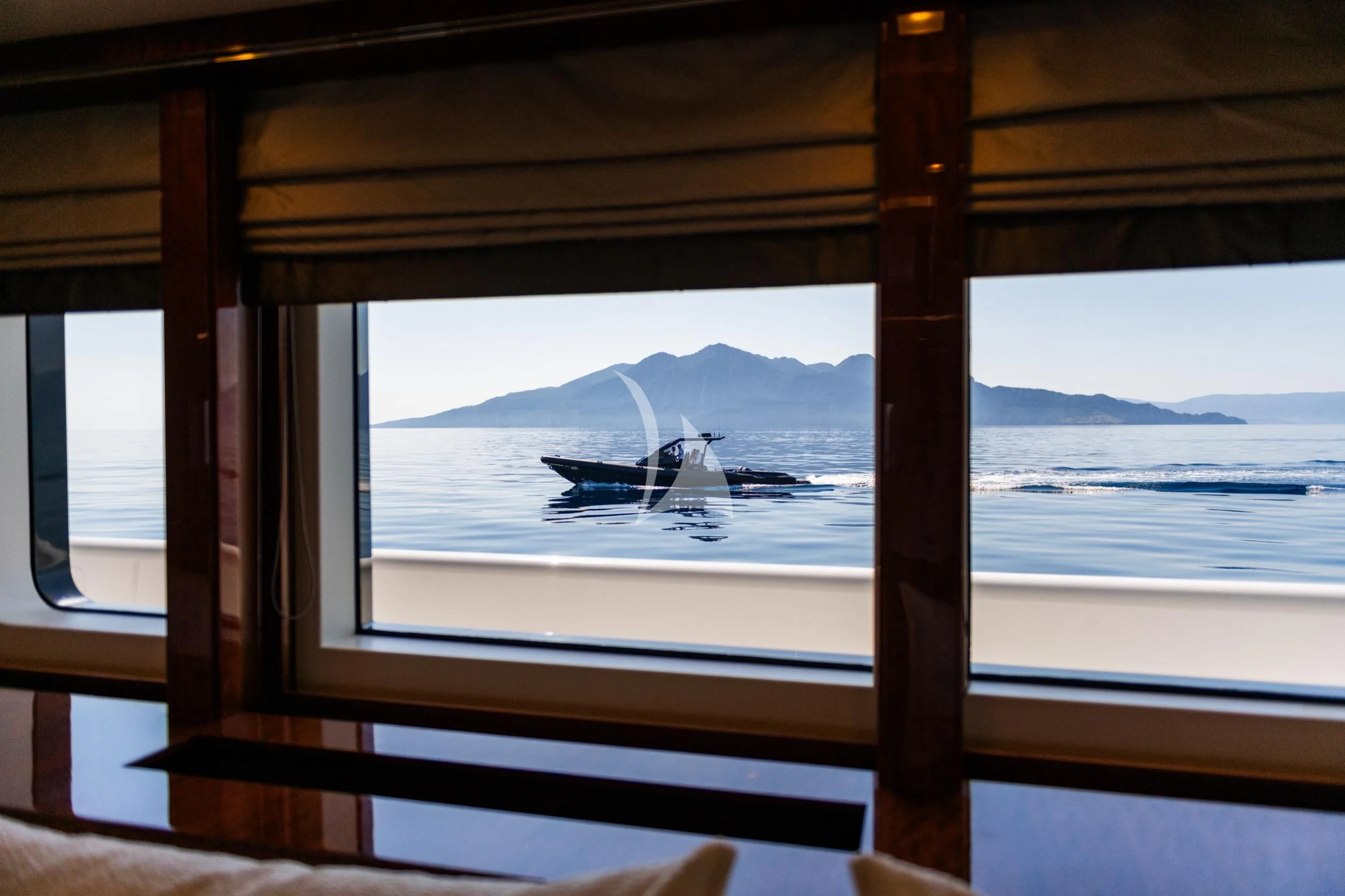 a plane on the window aboard HOLDIN' MY OWN Yacht for Sale