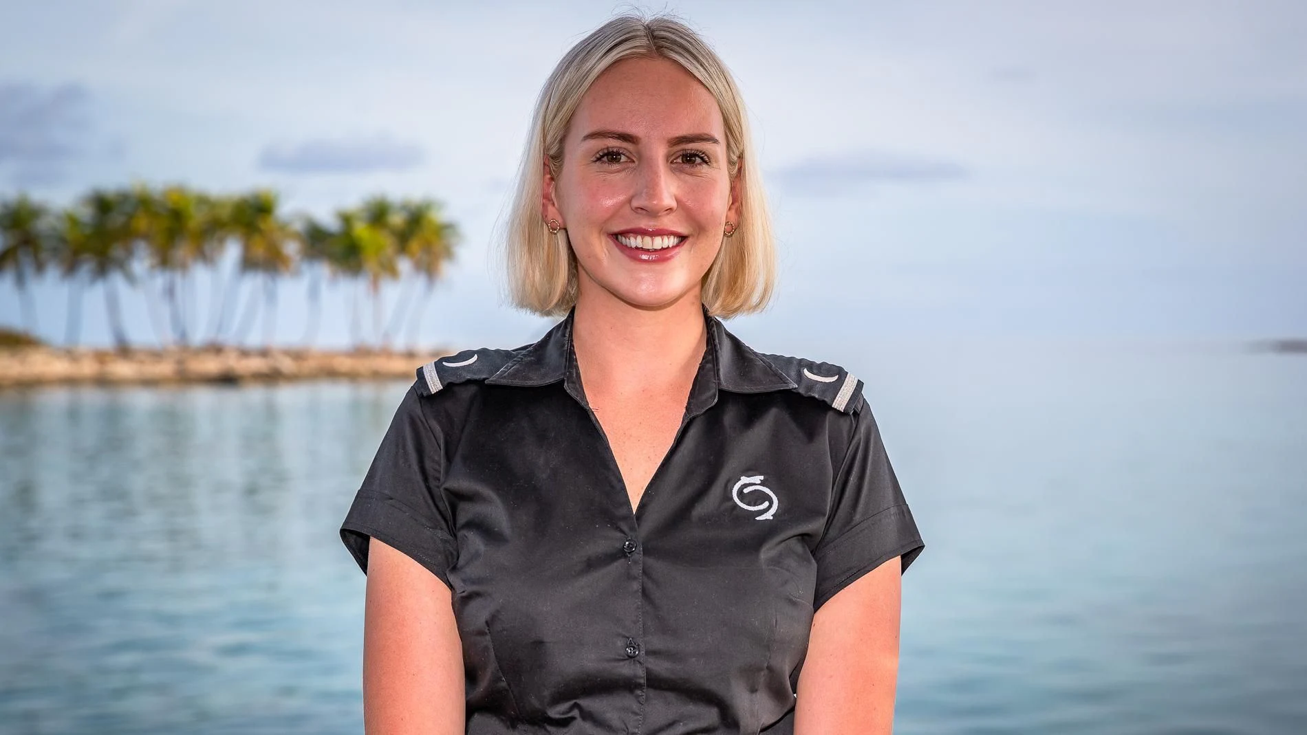 a woman standing in front of a body of water aboard HOLDIN' MY OWN Yacht for Sale
