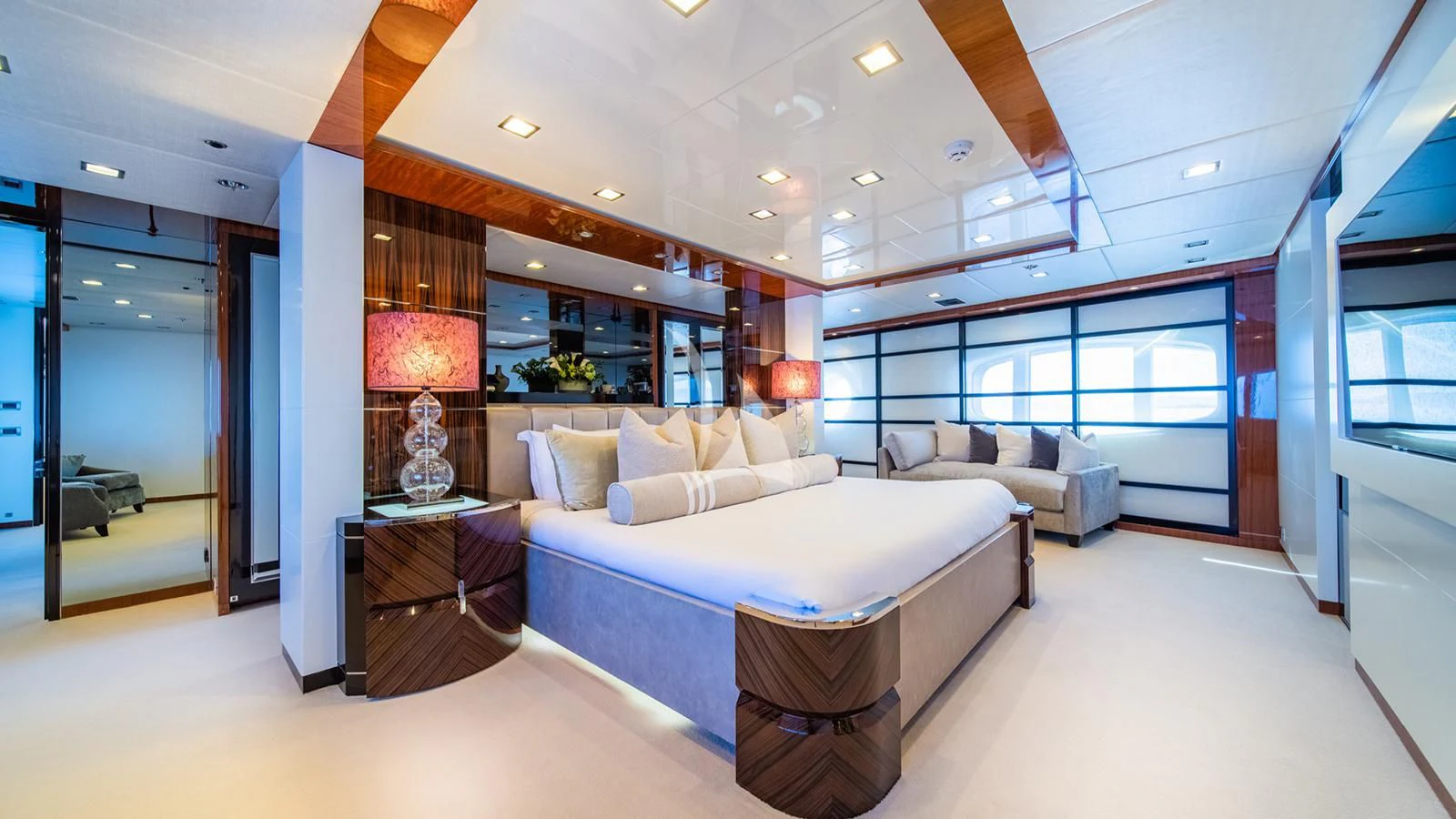 a large room with a bed and a couch aboard HOLDIN' MY OWN Yacht for Sale