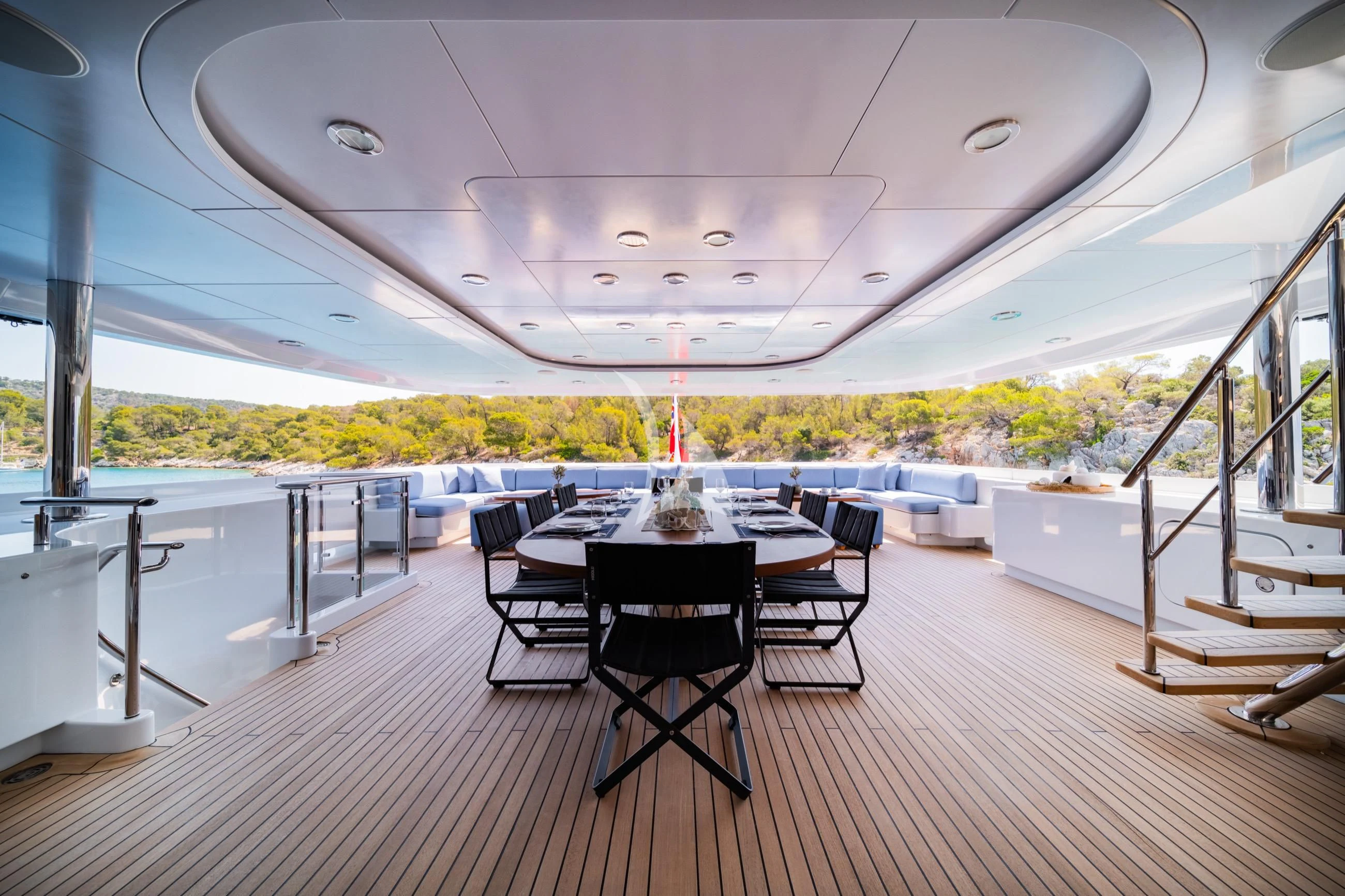 a room with a table and chairs aboard HOLDIN' MY OWN Yacht for Sale