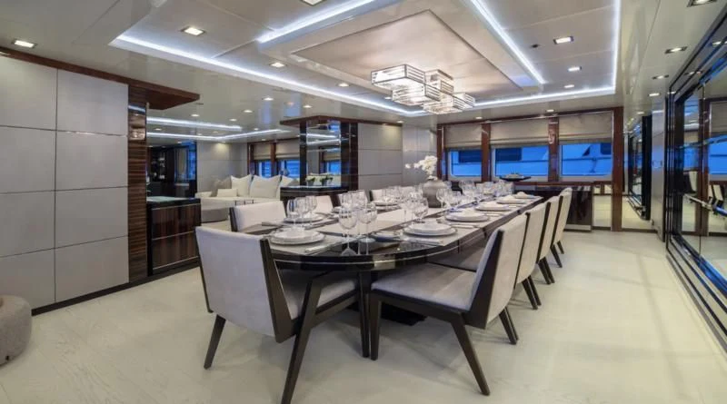 a conference room with tables and chairs aboard HOLDIN' MY OWN Yacht for Sale
