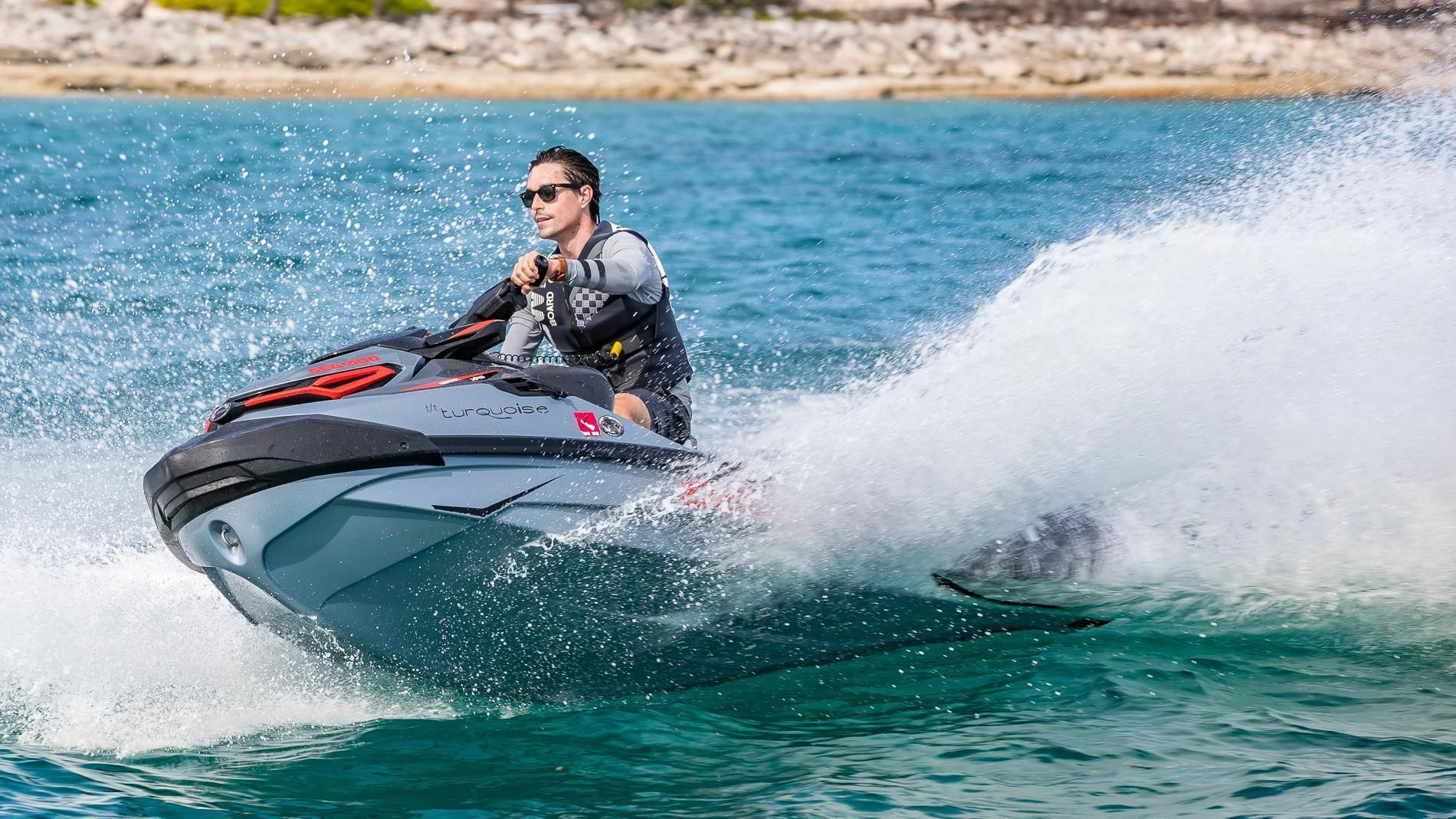a man on a jet ski aboard HOLDIN' MY OWN Yacht for Sale