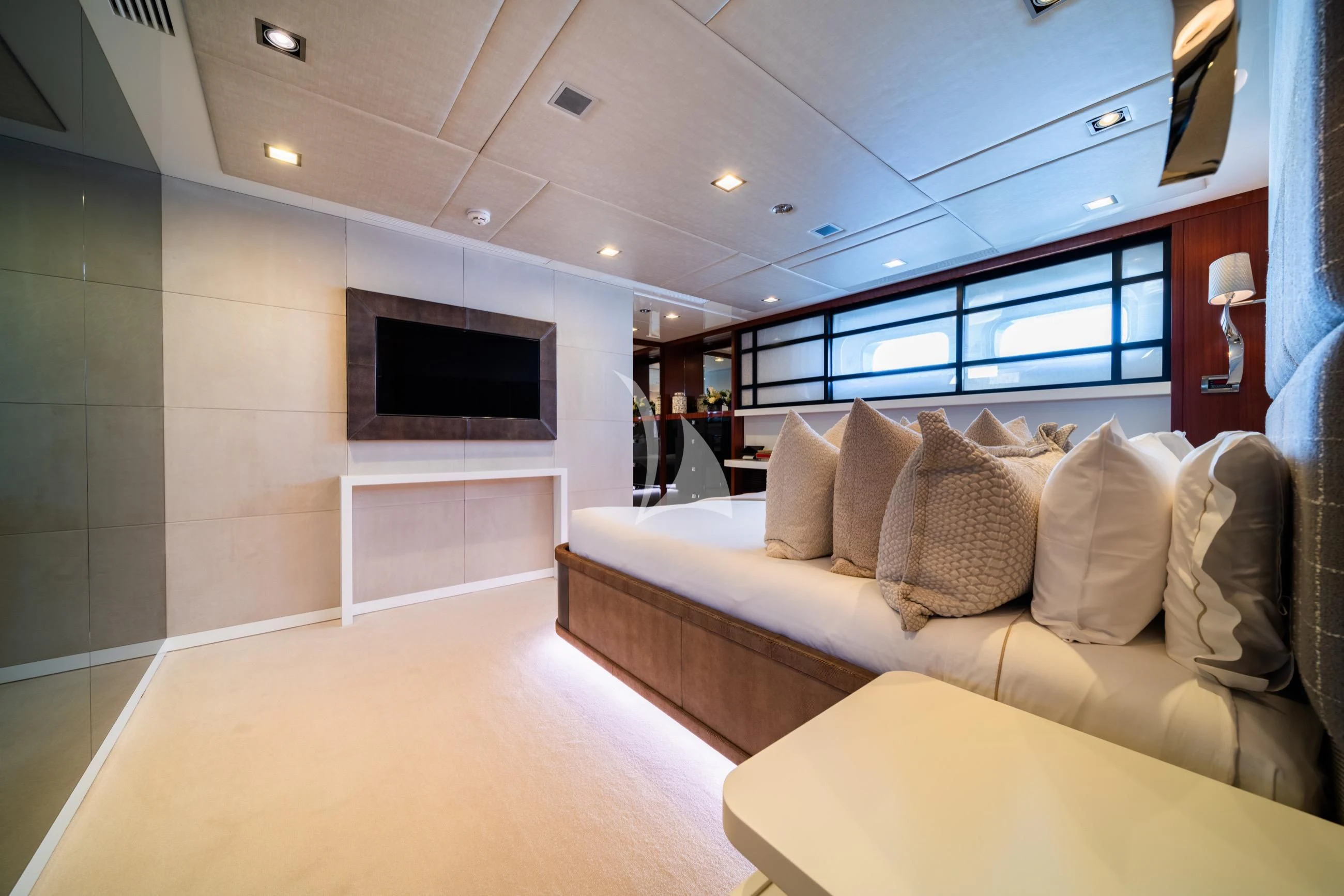 a large living room with a large sofa and a tv aboard HOLDIN' MY OWN Yacht for Sale