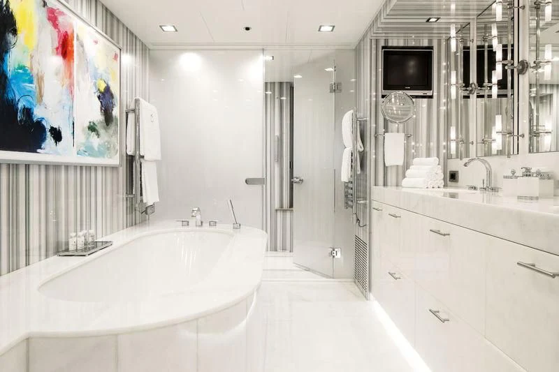 a bathroom with a large bathtub aboard HOLDIN' MY OWN Yacht for Sale