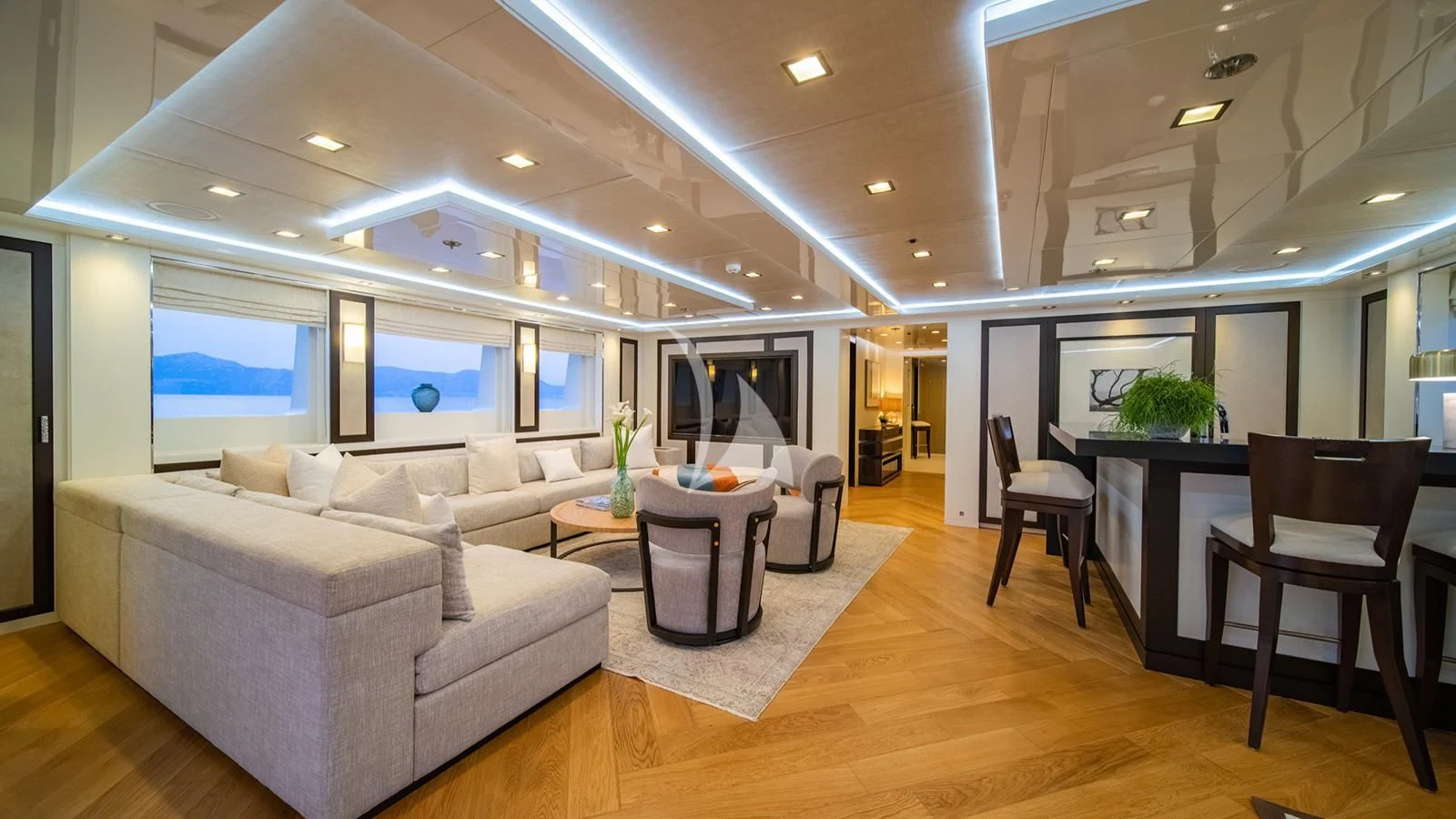 a living room with a couch and a table aboard HOLDIN' MY OWN Yacht for Sale