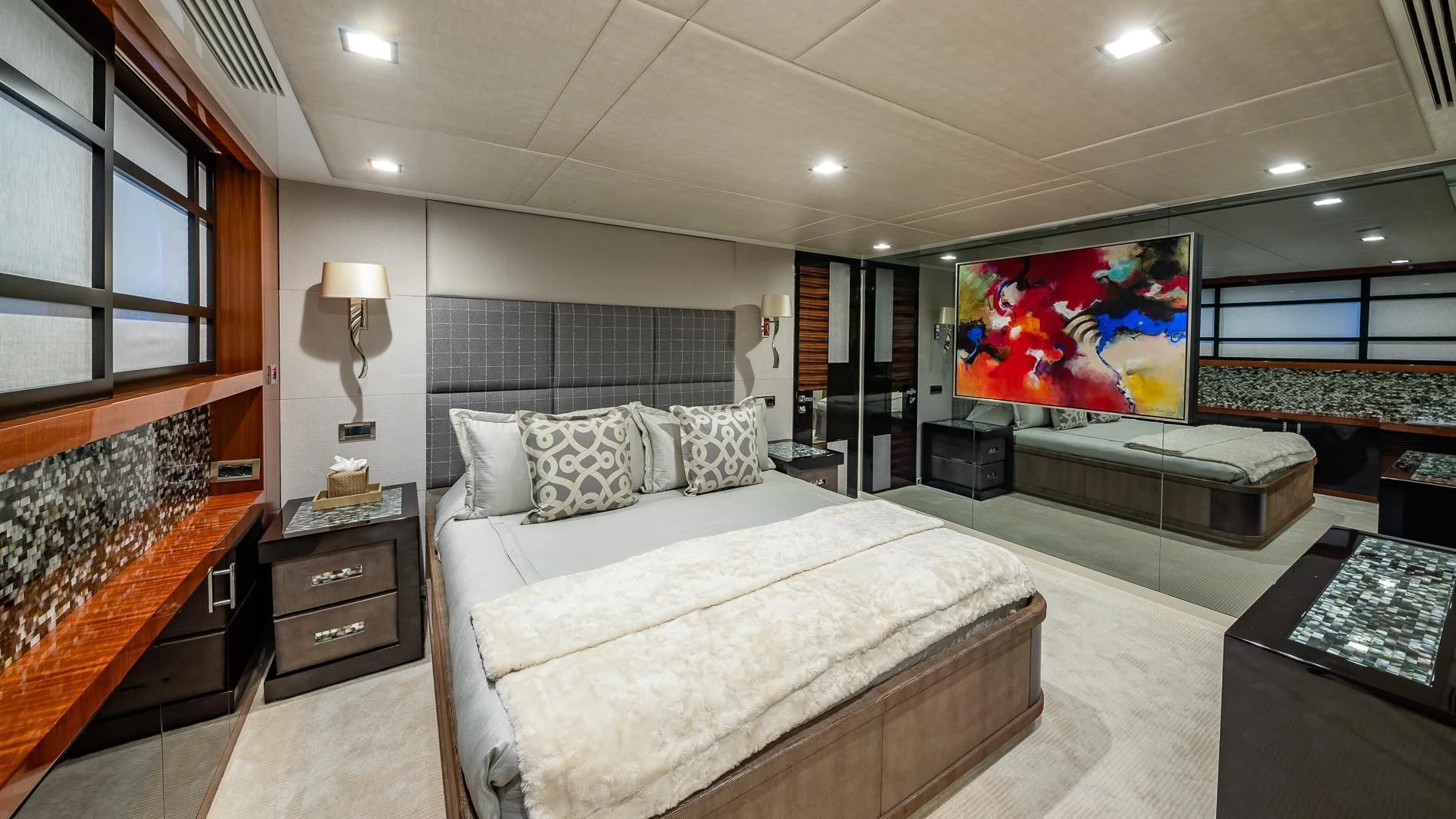 a bedroom with a bed and a piano aboard HOLDIN' MY OWN Yacht for Sale
