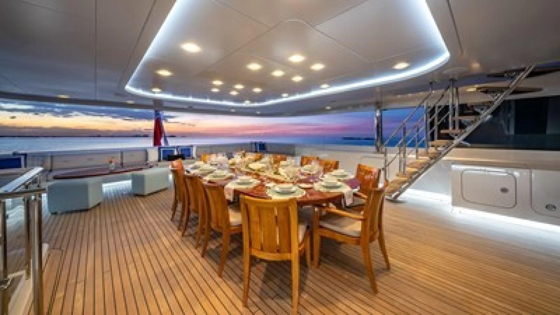a large kitchen with a table and chairs aboard HOLDIN' MY OWN Yacht for Sale