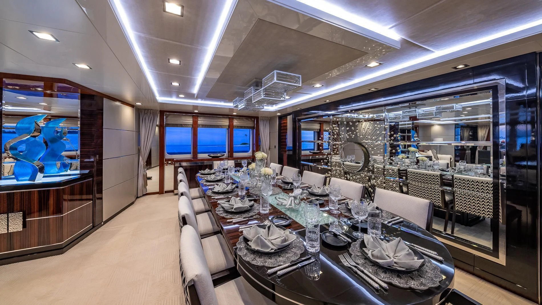 a room with a table and chairs aboard HOLDIN' MY OWN Yacht for Sale