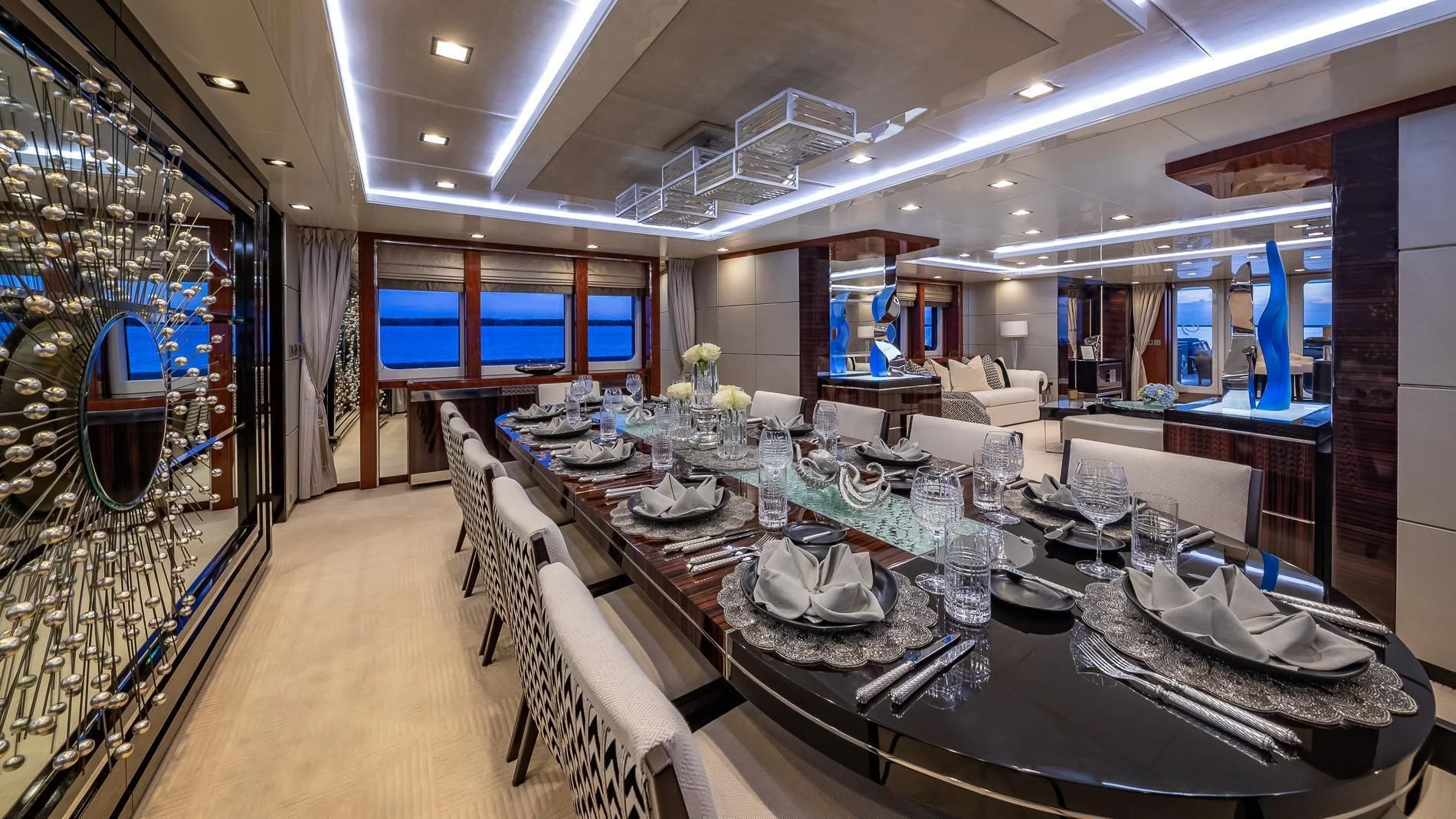 a large room with tables and chairs aboard HOLDIN' MY OWN Yacht for Sale