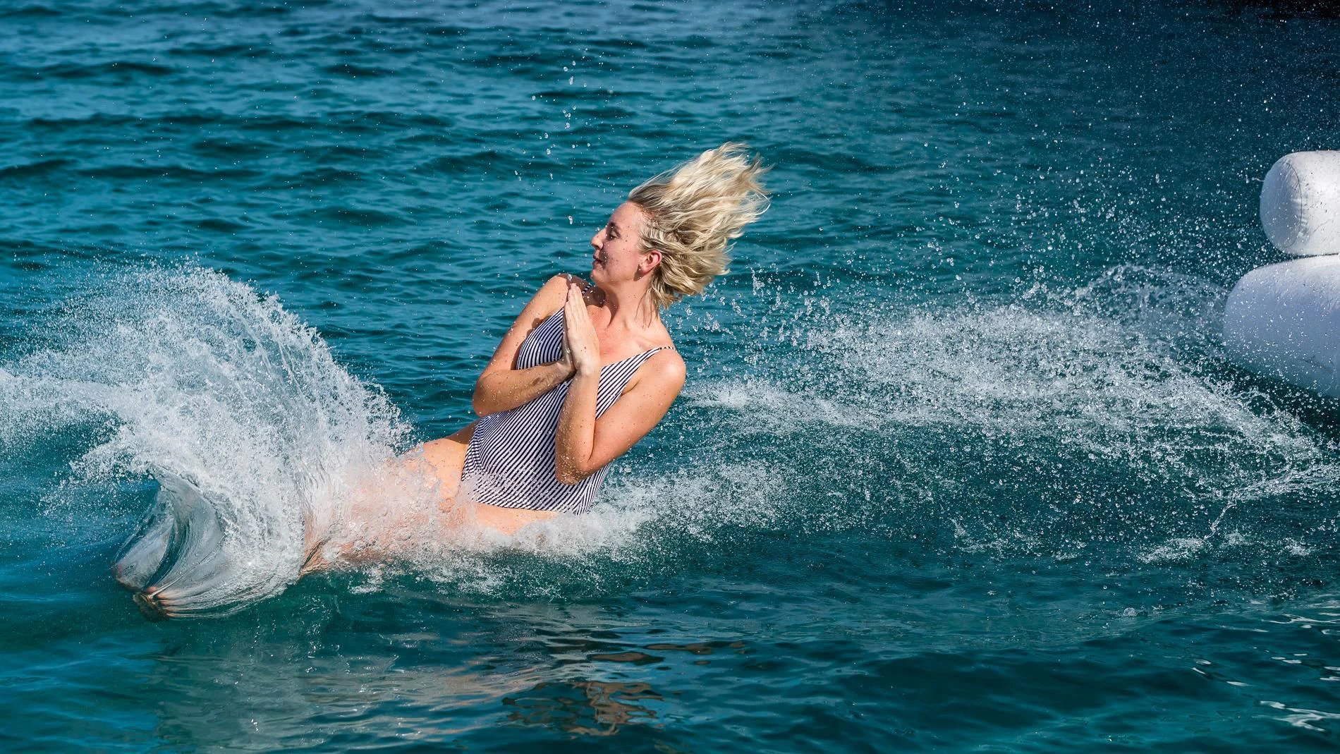 a person surfing on the waves aboard HOLDIN' MY OWN Yacht for Sale