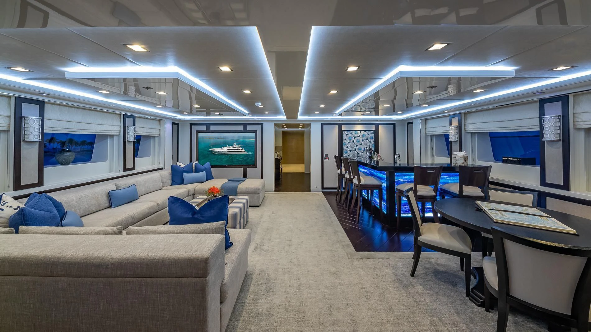 a room with a couch and a table and chairs aboard HOLDIN' MY OWN Yacht for Sale