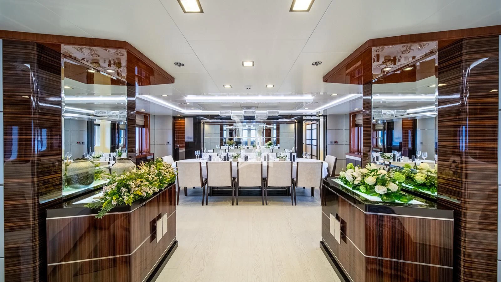 a large room with tables and chairs aboard HOLDIN' MY OWN Yacht for Sale