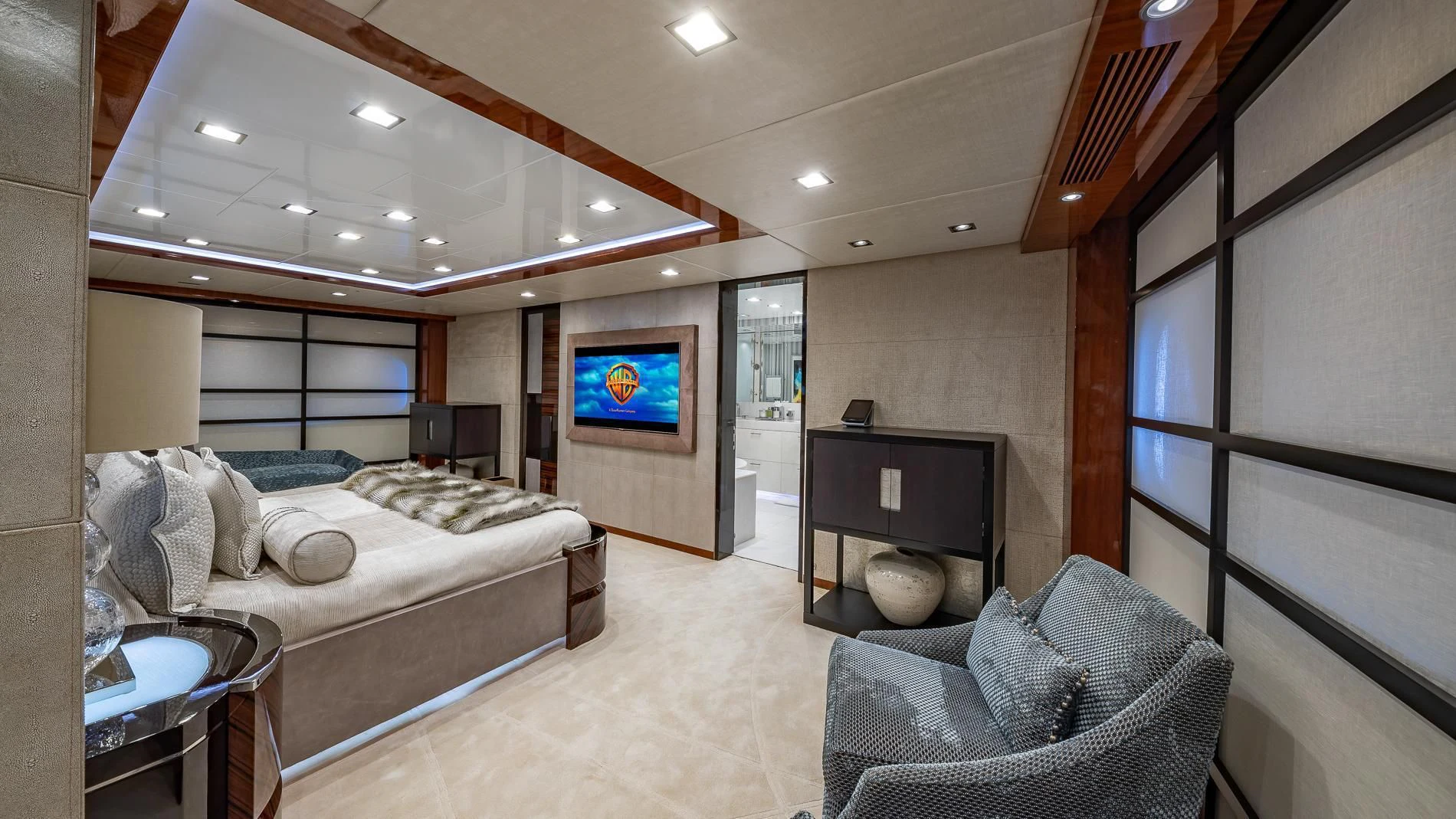 a bedroom with a bed and a tv aboard HOLDIN' MY OWN Yacht for Sale