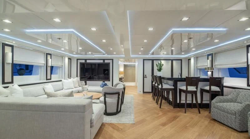 a living room with a couch and a table aboard HOLDIN' MY OWN Yacht for Sale