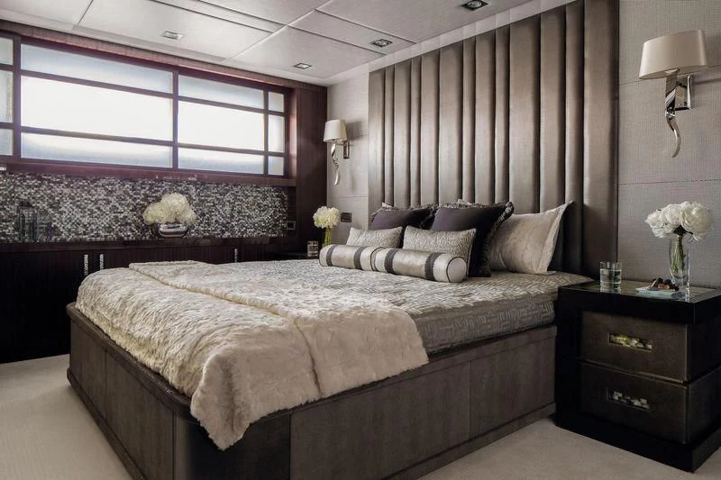 a bedroom with a large bed aboard HOLDIN' MY OWN Yacht for Sale