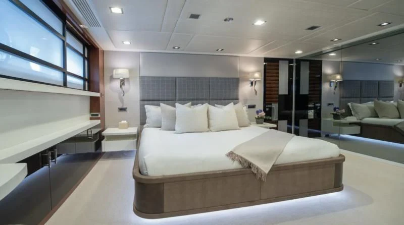 a large bed in a room aboard HOLDIN' MY OWN Yacht for Sale