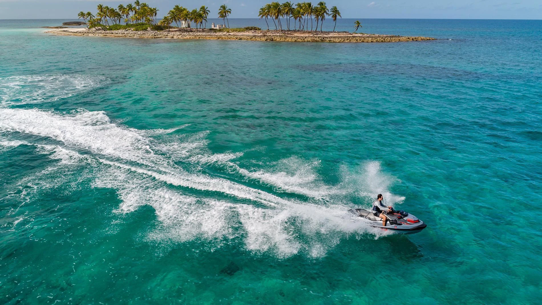 a person on a jet ski aboard HOLDIN' MY OWN Yacht for Sale