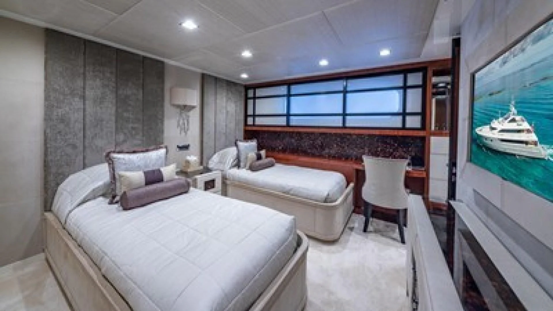 a room with a bed and a chair aboard HOLDIN' MY OWN Yacht for Sale